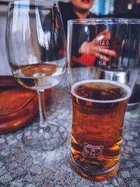 Close-up of beer glass on table