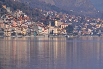 Aerial view of townscape by sea