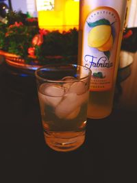 Close-up of beer glass on table