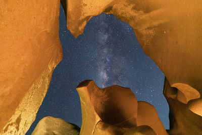 Close-up of reflection of water on sand