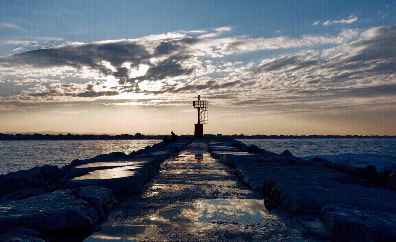 PIER OVER SEA AGAINST SKY