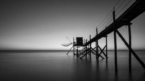 Panoramic view of a fishing hut on stilts called carrelet. black and white  photography