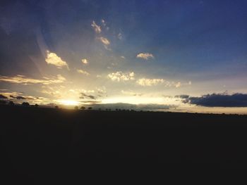 Scenic view of silhouette landscape against sky during sunset