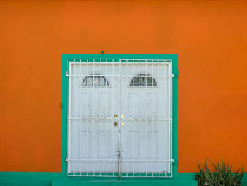 Closed door of orange building