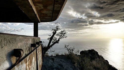 Scenic view of sea against cloudy sky