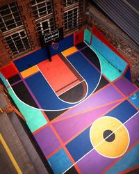 High angle view of multi colored chairs in swimming pool