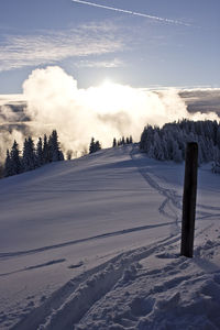 Scenic view of snow field against sky