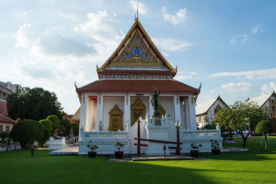 View of temple against cloudy sky