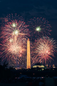 Firework display at night