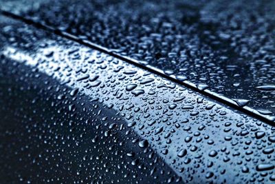 Close-up of water drops on glass