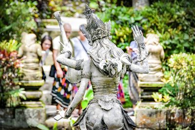 Statue of buddha against temple