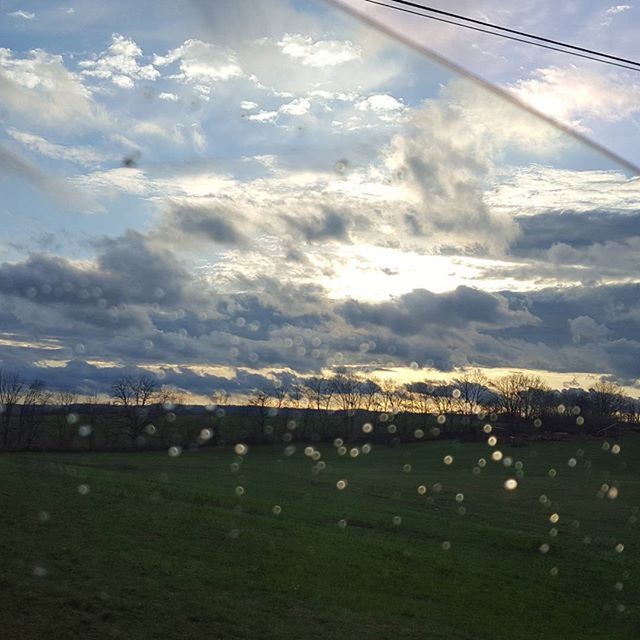 sky, cloud - sky, landscape, cloud, scenics, tranquil scene, tranquility, nature, connection, beauty in nature, cloudy, river, built structure, water, outdoors, no people, field, transportation, horizon over land, idyllic