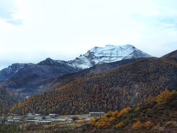 Scenic view of snowcapped mountains against sky