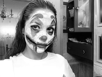 Close-up portrait of young man at home