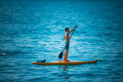 Man surfing in sea