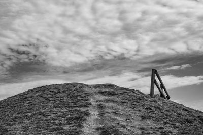 Scenic view of rocky land against sky