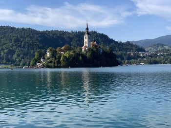 Church of the assumtion island seen in a perfect summer day on lake bled, slovenia