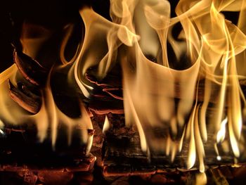 Close-up of burning candle