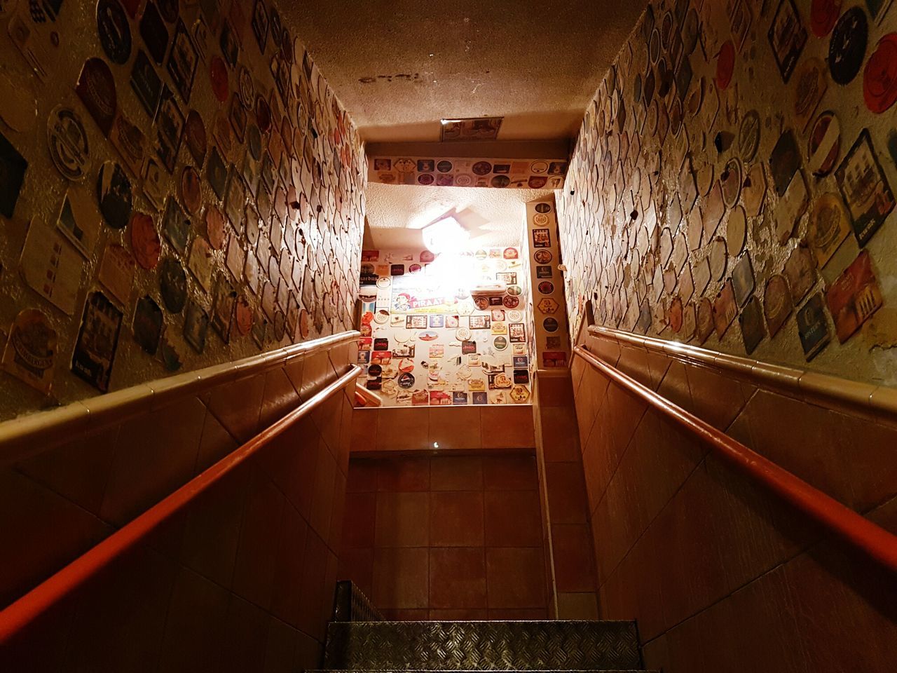 STAIRCASE IN ILLUMINATED UNDERGROUND WALKWAY