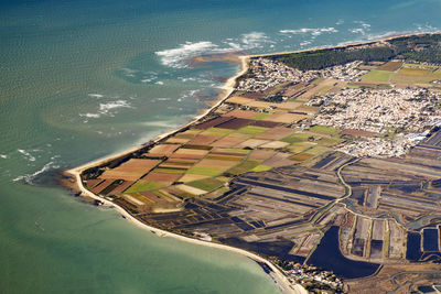 High angle view of sea and land