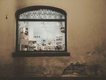 Reflection of window on wall in building