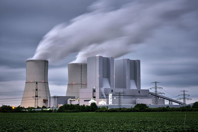 Panoramic view of factory against sky