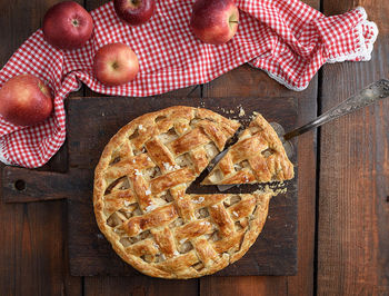 High angle view of pie with apples on table