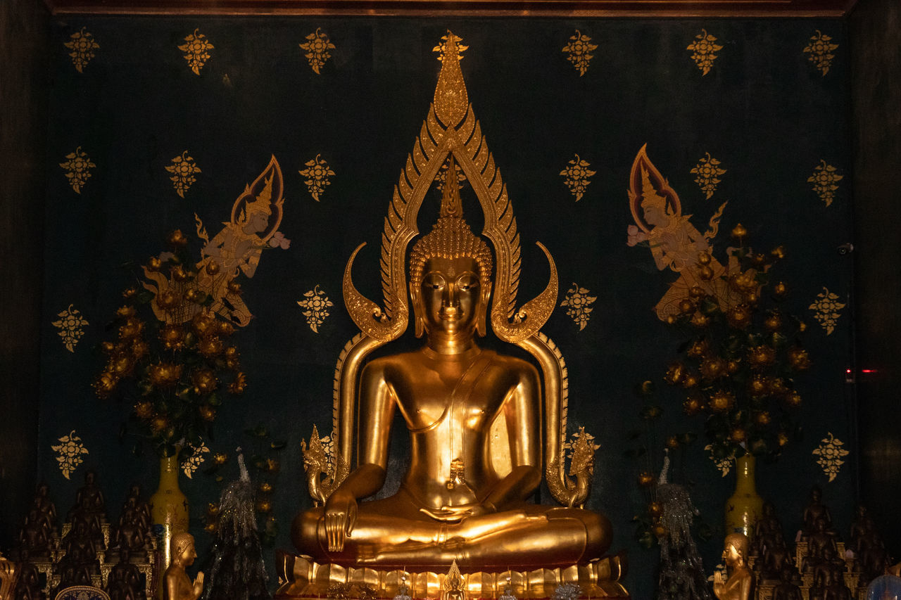 CLOSE-UP OF BUDDHA STATUE