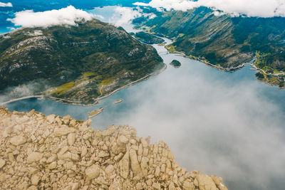 Aerial view of mountain by sea