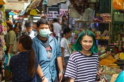 Portrait of people in market