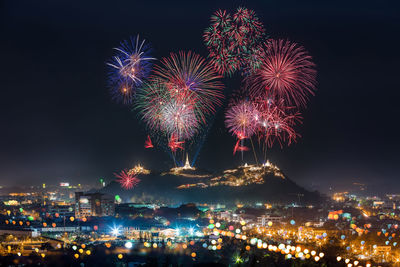 Firework display at night