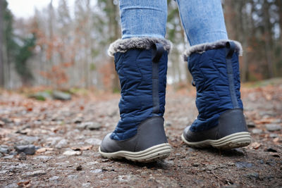 Rear view of traveler in hiking boots