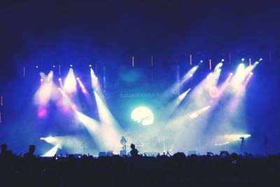 Panoramic view of crowd at music concert