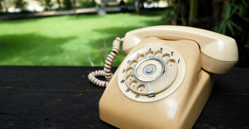 High angle view of telephone on table