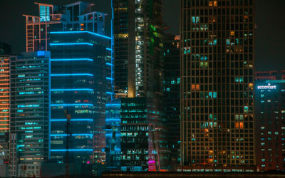 Illuminated modern buildings in city at night