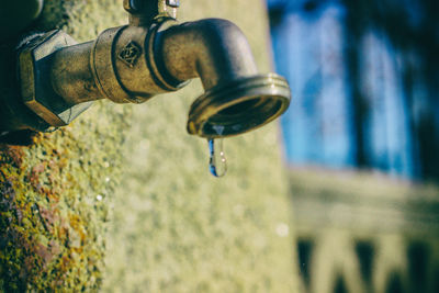 Close-up of hand holding water