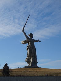 Low angle view of statue against sky