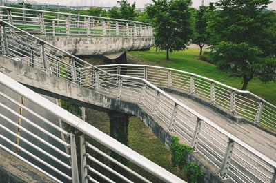 High angle view of bridge by trees