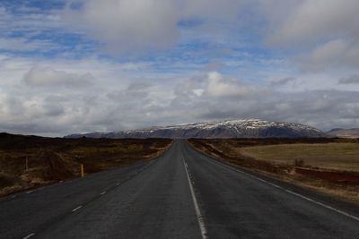 Empty road along landscape