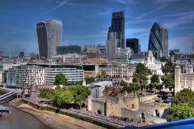 Buildings in city against sky