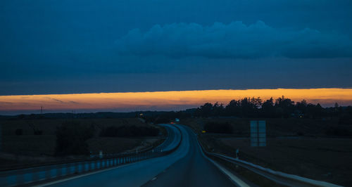 Road against sky at sunset