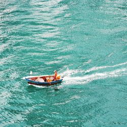 High angle view of people in sea