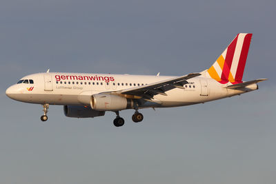 Airplane flying against clear sky