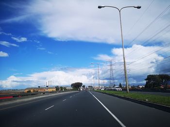 Road against sky in city