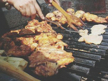 Close-up of person preparing food