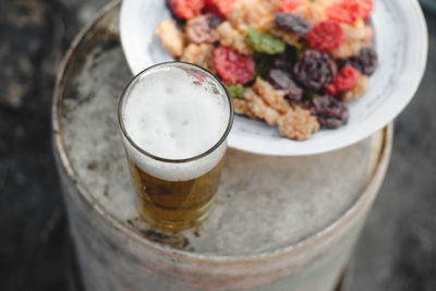 High angle view of drink in glass on table