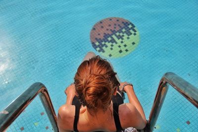 High angle view of woman in swimming pool