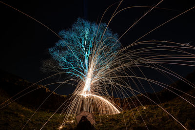 Firework display at night