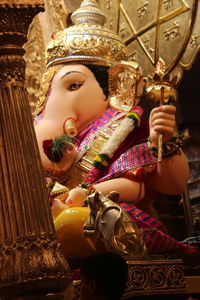 Buddha statue in temple outside building