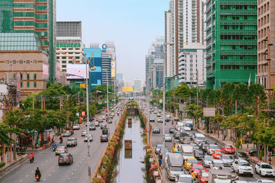 High angle view of traffic on road amidst buildings